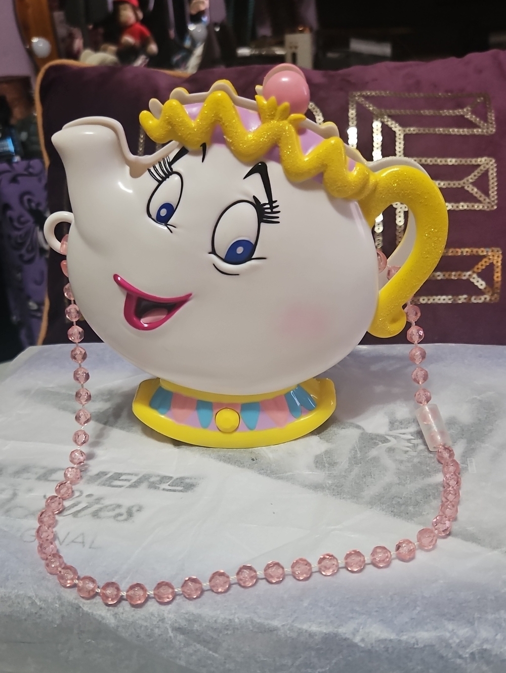 Disney Beauty And The Beast a Musical Mrs. Potts purse that sings "Be Our Guest"